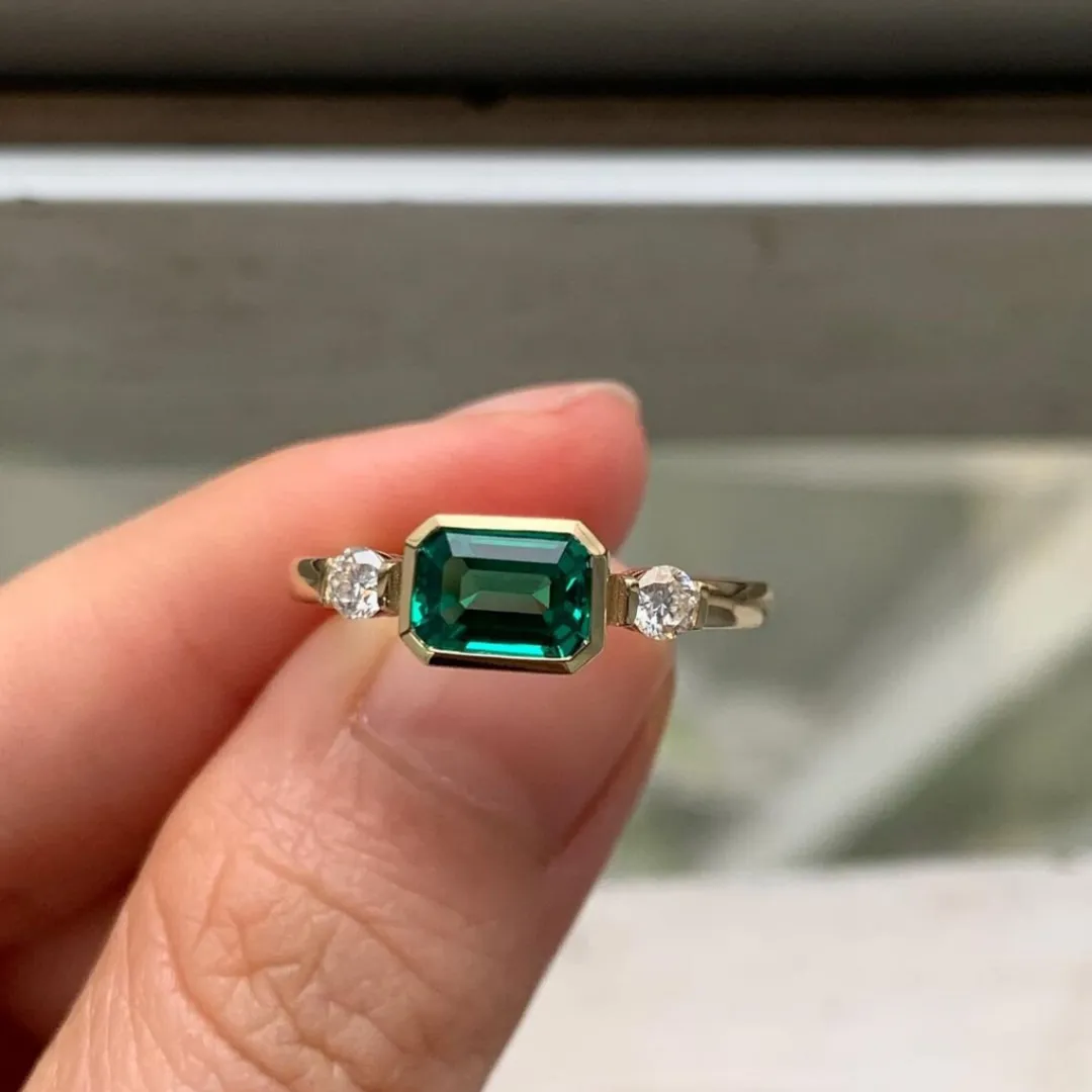 /public/photos/live/Green Emerald Moissanite 3 Stone Engagement Ring 472 (2).webp